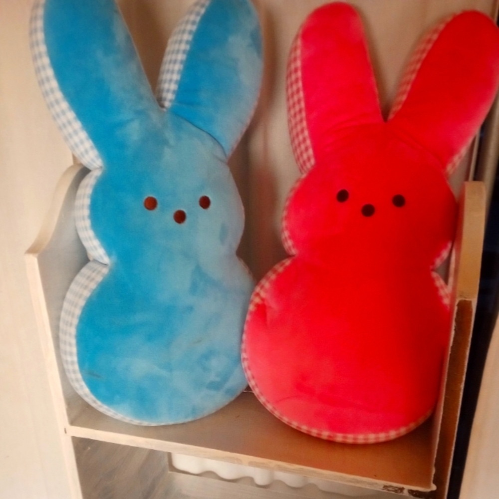 One blue one pink Peep's soft plush pillows